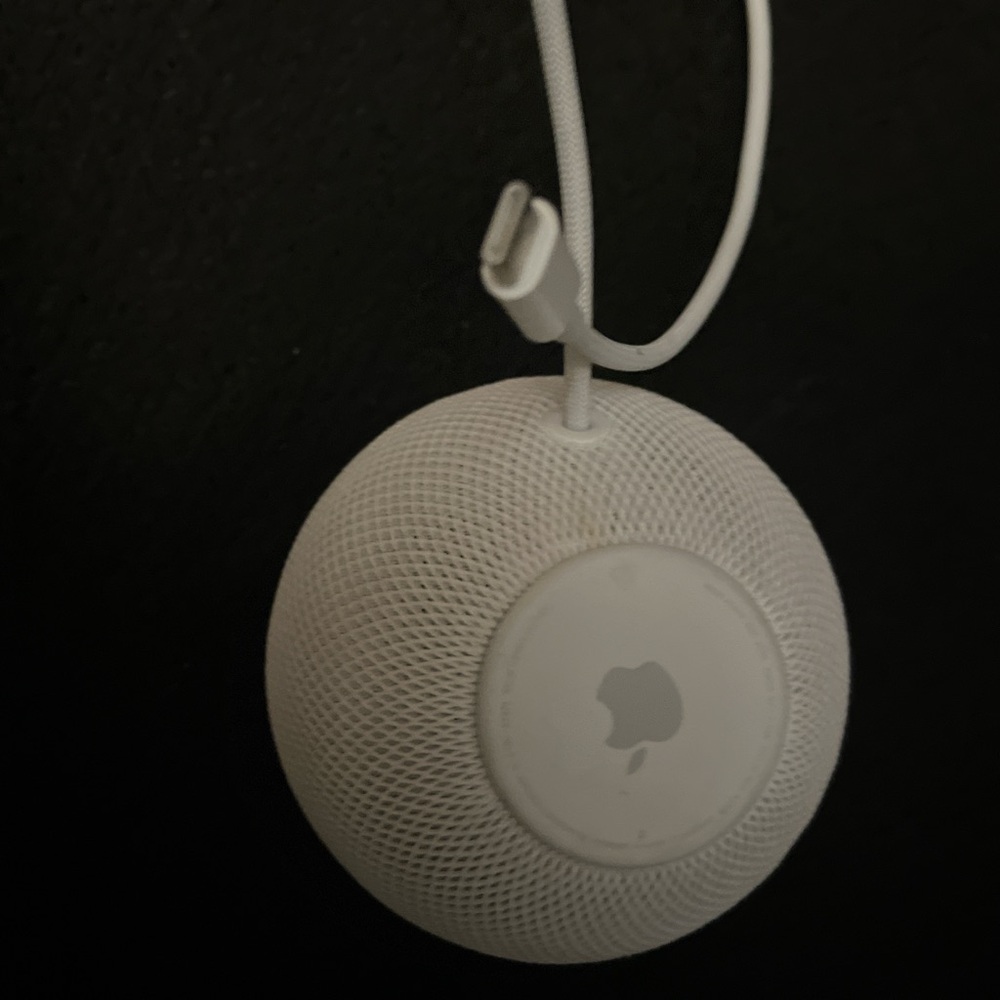 White Apple HomePod mini speaker